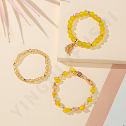 A yellow Crystal Tassel Bracelet with Pearl Beads - Minimalist, Colorful Resin, Couple Bracelet.