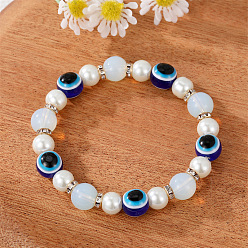 White pearl bracelet. Unique Pearl Bracelet with Devil Eye Charm and Fashionable Tassel Pendant