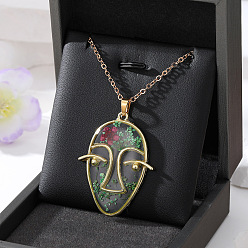 Green and red flower human face. Boho Floral Face Pendant Necklace with Dried Flowers for Women