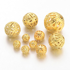 Golden Iron Filigree Beads, Filigree Ball, Round, Golden Color, Size: about 6~16mm in diameter, 6~15mm thick, hole: 1~6mm, about 200g/bag