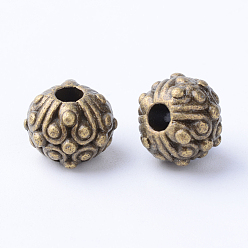 Antique Bronze Tibetan Style Alloy Beads, Round with Flower, Cadmium Free & Nickel Free & Lead Free, Antique Bronze, 11x8~8.5mm, Hole: 3mm, about 375pcs/1000g