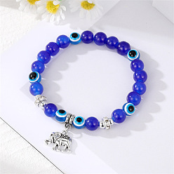 Blue elephant pendant bracelet. Unique Pearl Bracelet with Devil Eye Charm and Fashionable Tassel Pendant