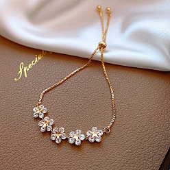 BR20Y0183 Minimalist Floral & Star Charm Adjustable Gold Bracelet with Crystals for Women