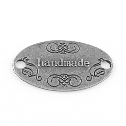 Antique Silver Tibetan Style Alloy Links, Lead Free, Oval with Word handmade, Antique Silver, 31x18x1.5mm, Hole: 3mm, about 325pcs/1000g