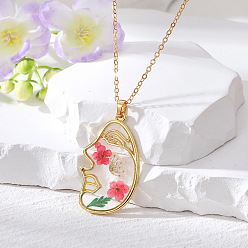 Side face with powdered flowers. Boho Floral Face Pendant Necklace with Dried Flowers for Women