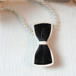 black bow tie Pince à cheveux rétro en cuir pu noir mat avec un design minimaliste et un fermoir à frange
