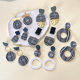 Black and gray color matching autumn and winter irregular acrylic metal stitching soft pottery earrings geometric clay female earrings