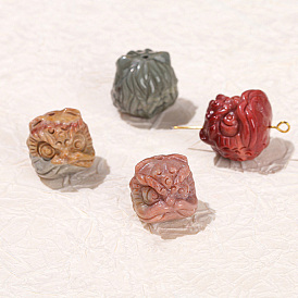 Perles sculptées en agate d'alashan naturelle, têtes de lion