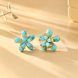 Ohrstecker aus Messing und synthetischem Türkis, Blume, golden
