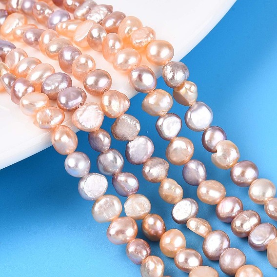 Нити из натурального культивированного пресноводного жемчуга, двух сторон полированной