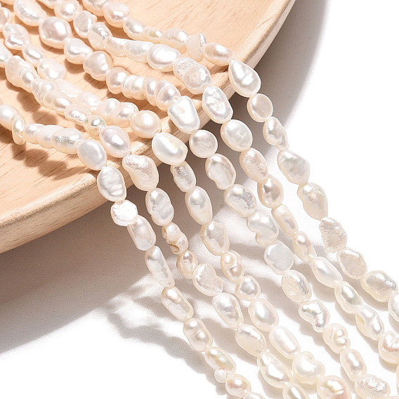 Нити из натурального культивированного пресноводного жемчуга, двух сторон полированной
