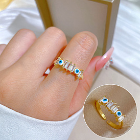 Fashionable Micro-inlaid Luxury Ring with Open Eye Zircon - Minimalist Style, Index Finger.