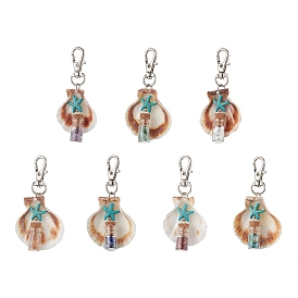 Подвеска в виде стеклянной бутылки желаний из натурального авантюрина, аметиста, хаулит, лазурита, красной яшмы и синтетической бирюзы, с натуральной ракушкой и поворотными застежками из сплава