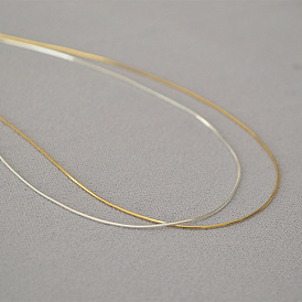 Ultra-thin and delicate shiny gold wire collarbone chain necklace - eight-section snake chain.