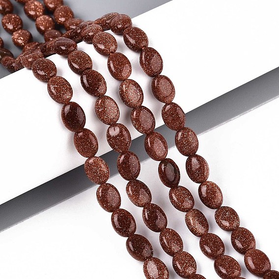 Синтетические голдстоуновские бисер пряди, Плоско-овальные