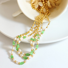 Collier en pierre d'oeil de chat vert et perles d'eau douce avec pendentif en acier titane - bijoux uniques pour femmes
