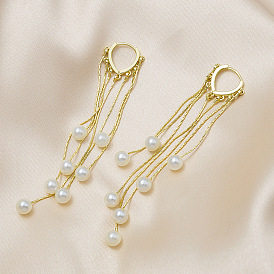 Exquisite Pearl Tassel Earrings - Trendy, Elegant, Statement Earrings.