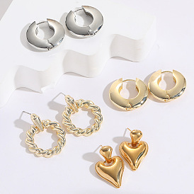 Chic Heart-shaped Earrings for Women - Shiny Metal Ear Studs with Twisted Design