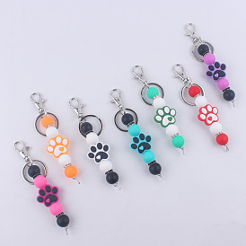 Porte-clés rond en perles de silicone à imprimé patte de chien, avec les accessoires en fer, pour accessoires de pendentif de sac à dos de voiture