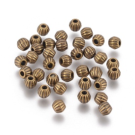Alliage de perles d'entretoise de style tibétain, sans plomb et sans cadmium, Toupie, 4x4.5mm, Trou: 1mm