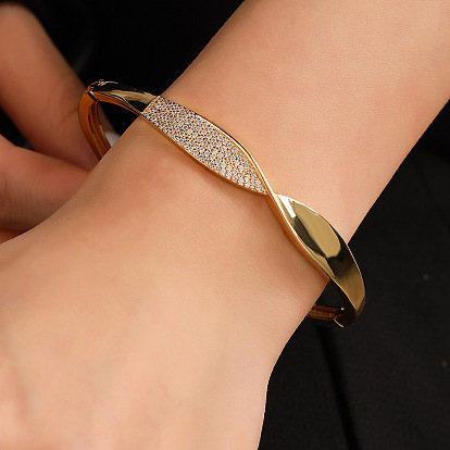 Fashionable geometric copper bracelet with copper inlaid zircon stone leaves and branches.