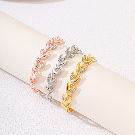Elegant 18K Gold Leaf Bracelet with Diamonds for Wedding and Fashion.