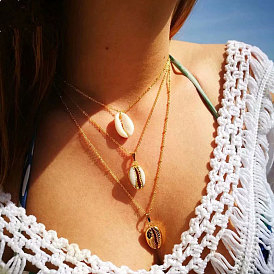 Chic Multi-Layered Necklace with Metal Seashell Pendant and Multiple Elements
