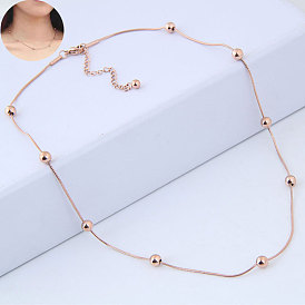 Collier pendentif rond en perles de titane et d'acier, doux et élégant pour femmes