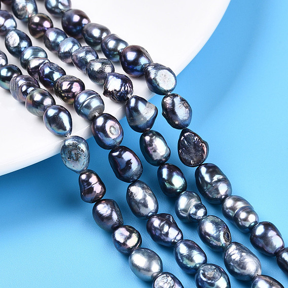 Нити из натурального культивированного пресноводного жемчуга, двух сторон полированной, окрашенные