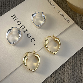 Minimalist Metal Hollow Heart-shaped Earrings - Unique Design, Elegant, Peach Heart Ear Decor.