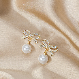 Sweet Pearl Butterfly Bowknot Earrings with Delicate Rhinestones - Elegant and Versatile for Daily Wear