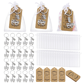 40шт. брелки из сплава, маска с прямоугольником, 40шт. мешочки из органзы, 40шт. ценников из крафт-бумаги, прямоугольник со словом спасибо за то, что отпраздновали с нами