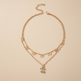 Collier double couche cerise avec incrustation de diamants et chaîne de cou multicouche papillon