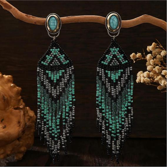 Богемные серьги-гвоздики ручной работы из стеклянного бисера с кисточками., с синтетическими бирюзовый, овал с рисунком ромба, античная бронза