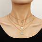 Stylish Multi-layer Necklace with Heart Pendant and Evil Eye Charm - Fashionable Statement Jewelry for Sweaters