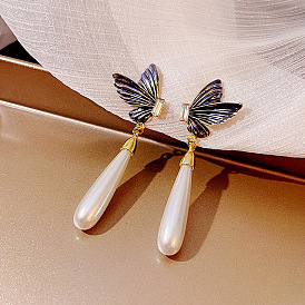 Winter Angel Wing Pearl Pendant Earrings - Exaggerated Design, Light Luxury, Elegant and Temperament.