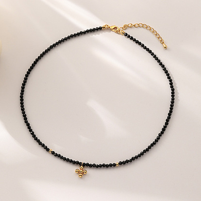 Minimalist Black Beaded Cross Necklace - Unique, Sophisticated, Fashionable Choker Accessory.