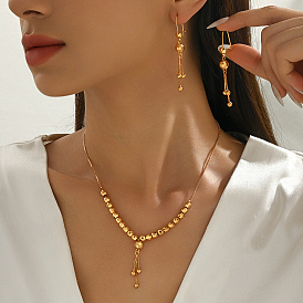 Винтажное латунное колье и серьги с круглыми бусинами и кисточками для женщин.