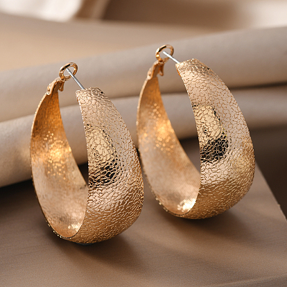 Серьги-кольца с текстурой из железа