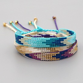 Bracelet fait main de style ethnique bohème avec tissage de perles de couleur dégradé géométrique.