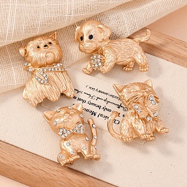 Броши из матового светло-золотистого сплава со стразами