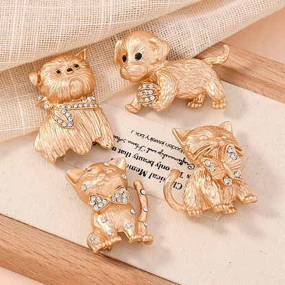 Броши из матового светло-золотистого сплава со стразами