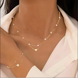 Ожерелья и двухслойные браслеты из искусственного жемчуга в форме сердца и пластика