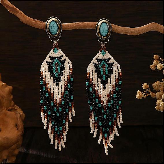 Богемные серьги-гвоздики ручной работы из стеклянного бисера с кисточками., с синтетическими бирюзовый, овал с рисунком ромба, античная бронза