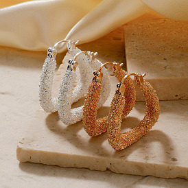 Треугольные серьги-кольца из латуни