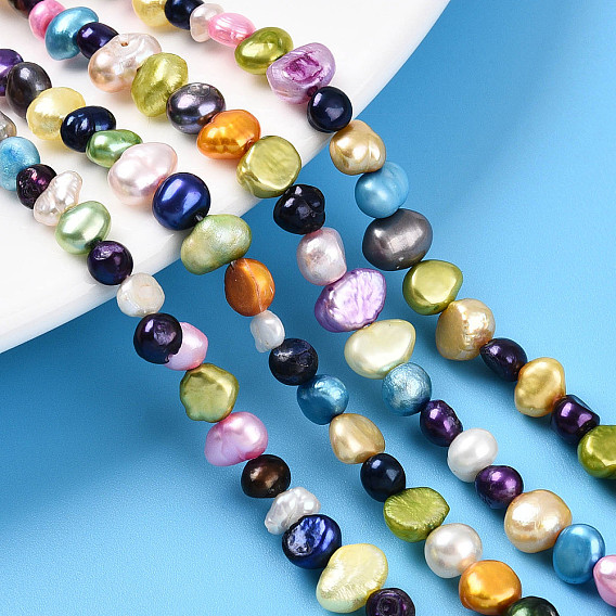 Нити из натурального культивированного пресноводного жемчуга, окрашенные, две боковые полированные