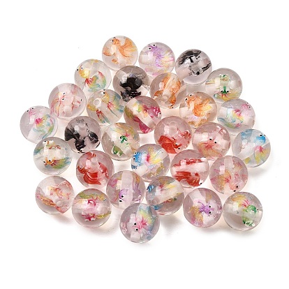 Des perles de résine transparentes, rond avec des poissons rouges, avec de la poudre de paillettes