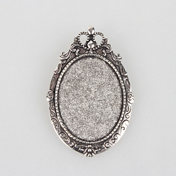 Argent Antique Accessoires d'époque de broche cabochon en alliage de style tibétain, sans cadmium et sans plomb, assortiment d'apprêts avec clou en fer, ovale, argent antique, plateau: 40x30 mm, 62x40x2 mm, pin: 0.6 mm