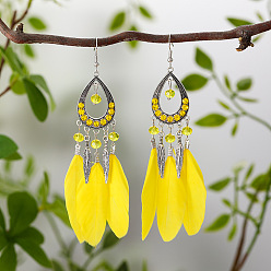 Желтый Серьги-капли из сплава со стразами, с пером, античное серебро, желтые, 23x11 мм