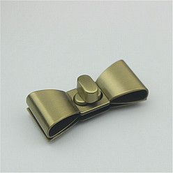 Brushed Antique Bronze Застежки для кошелька с поворотным замком из цинкового сплава, бантом, аксессуары для кошелька diy bag, щеткой античная бронза, 2.2x5.6x1.2 см
